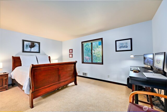 10 Olympic Pl Unit 10, Port Ludlow, WA 98365 - bedroom featuring light carpet, a desk, and baseboards