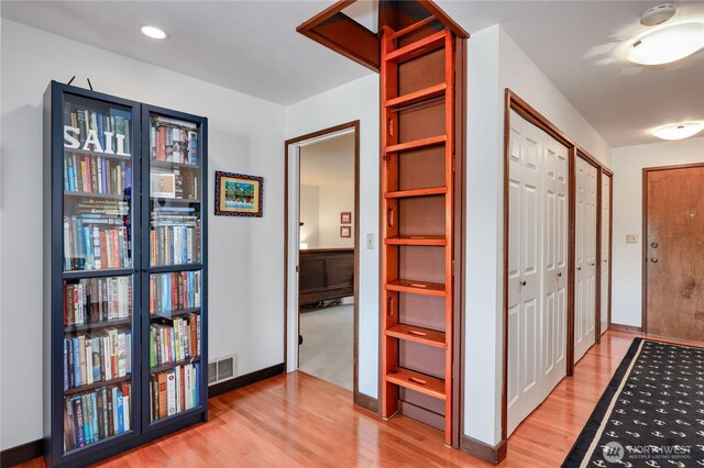 10 Olympic Pl Unit 10, Port Ludlow, WA 98365 - hall with light wood-style flooring and baseboards