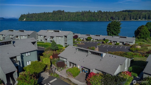 10 Olympic Pl Unit 10, Port Ludlow, WA 98365 - aerial perspective of suburban area featuring a forest and a nearby body of water