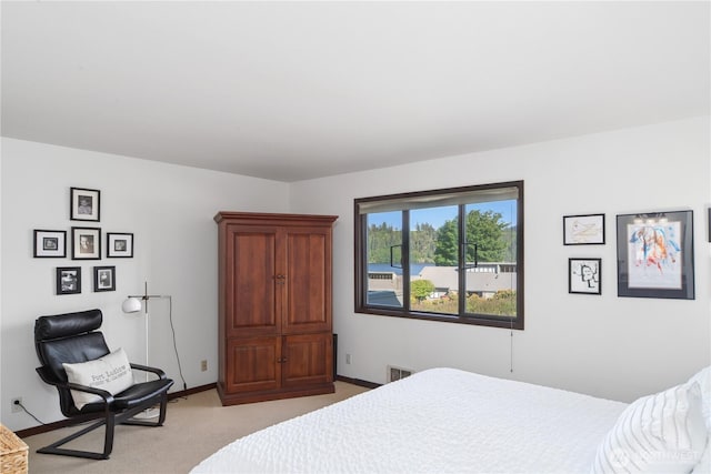 10 Olympic Pl Unit 10, Port Ludlow, WA 98365 - bedroom with light carpet and baseboards