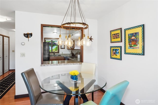 10 Olympic Pl Unit 10, Port Ludlow, WA 98365 - dining space with wood finished floors and baseboards