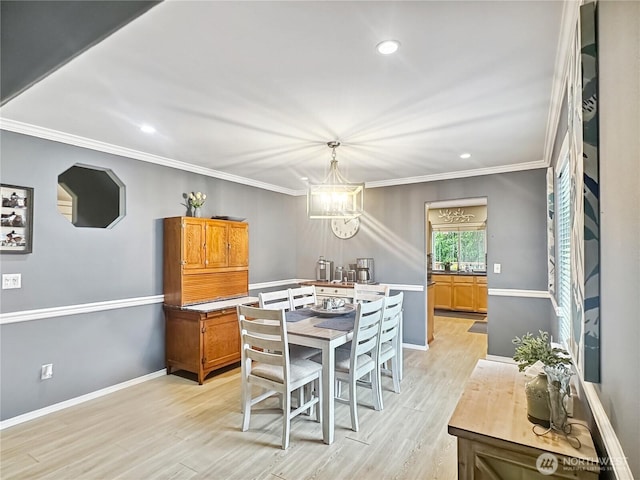 4207 Campus Green Loop NE, Lacey, WA 98516 - dining space with a chandelier, light wood finished floors, recessed lighting, ornamental molding, and baseboards