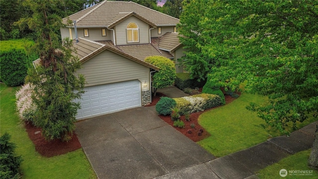 4207 Campus Green Loop NE, Lacey, WA 98516 - view of front of house featuring a tile roof and a front lawn