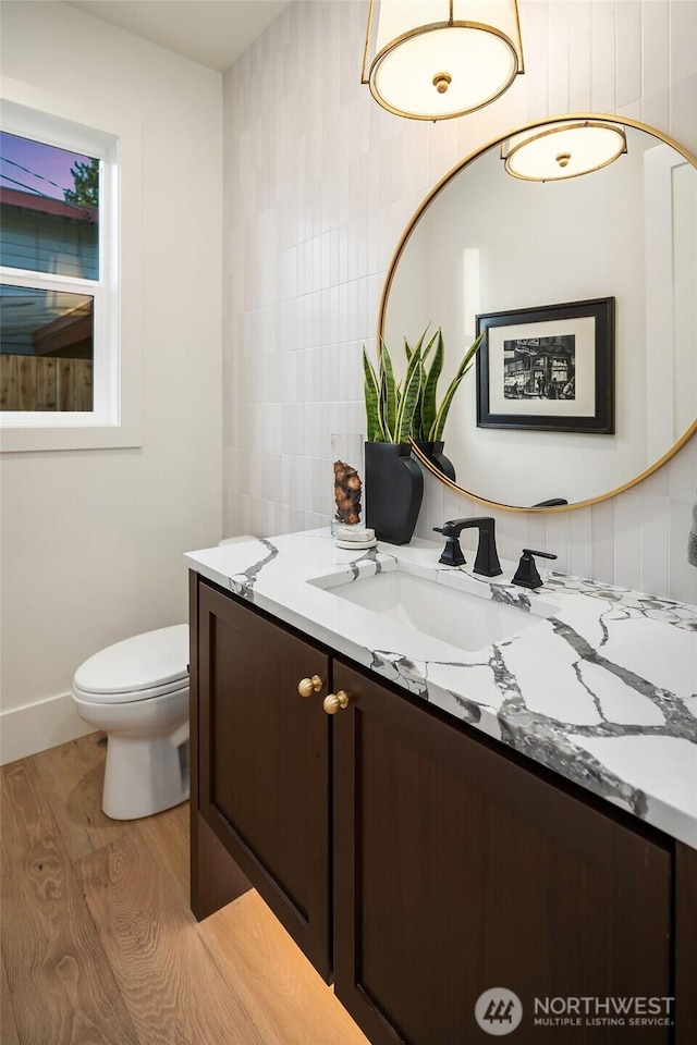 3976 154th Ave SE, Bellevue, WA 98006 - bathroom featuring vanity, wood finished floors, and toilet