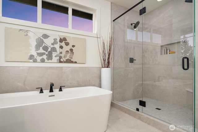 3976 154th Ave SE, Bellevue, WA 98006 - full bath featuring a stall shower, marble finish flooring, a soaking tub, and tile walls