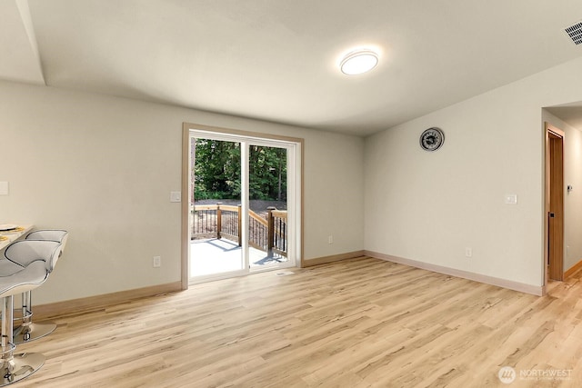 9630 SE Driftwood Dr, Port Orchard, WA 98367 - spare room featuring light wood-style floors and baseboards