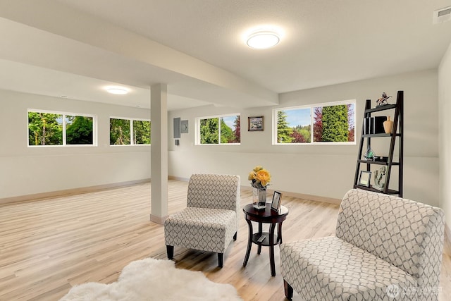 9630 SE Driftwood Dr, Port Orchard, WA 98367 - sitting room featuring plenty of natural light, baseboards, and wood finished floors