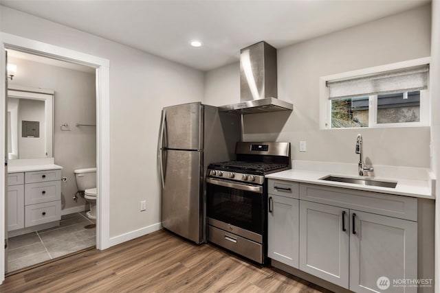 5126 S Creston St, Seattle, WA 98178 - kitchen featuring stainless steel appliances, a sink, wall chimney range hood, gray cabinetry, and recessed lighting