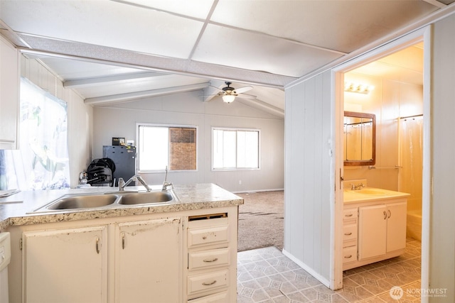 3701 Gun Club Rd Unit 16, Yakima, WA 98901 - kitchen with a sink, ceiling fan, light countertops, and a peninsula