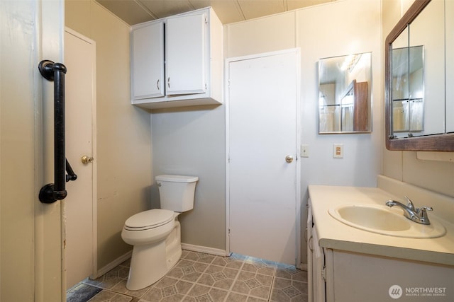 3701 Gun Club Rd Unit 16, Yakima, WA 98901 - bathroom with toilet, vanity, and tile patterned floors