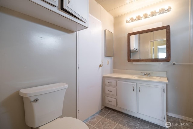 3701 Gun Club Rd Unit 16, Yakima, WA 98901 - bathroom with toilet, vanity, and tile patterned floors
