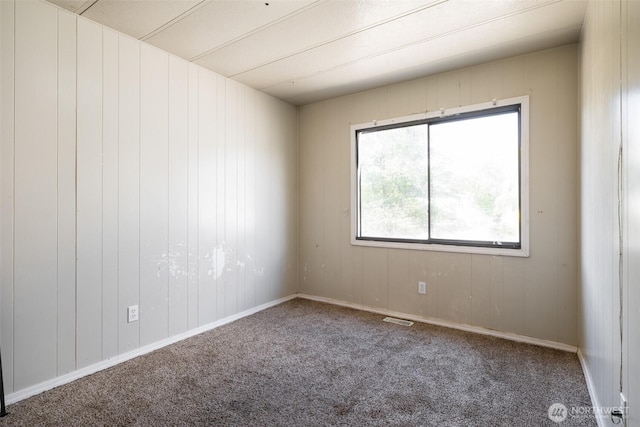 3701 Gun Club Rd Unit 16, Yakima, WA 98901 - empty room featuring carpet floors and wood walls