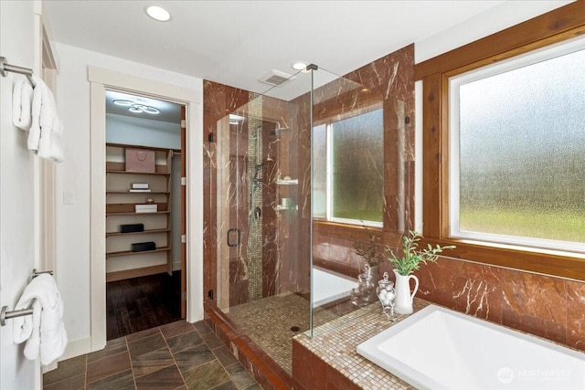 8607 436th Ave SE, North Bend, WA 98045 - bathroom with a stall shower, a bath, and recessed lighting