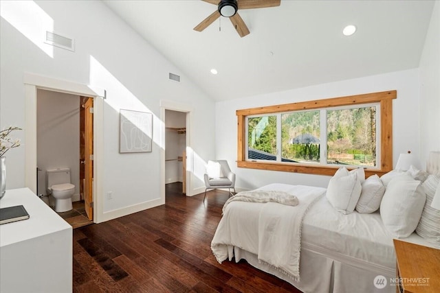 8607 436th Ave SE, North Bend, WA 98045 - bedroom with dark wood-style floors, recessed lighting, a spacious closet, ensuite bathroom, and baseboards