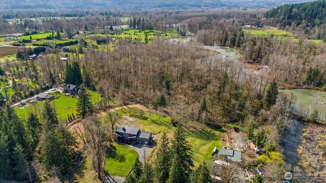 8607 436th Ave SE, North Bend, WA 98045 - aerial view of property and surrounding area with a heavily wooded area and rural landscape