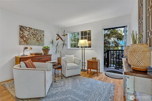 sitting room featuring wood finished floors and baseboards