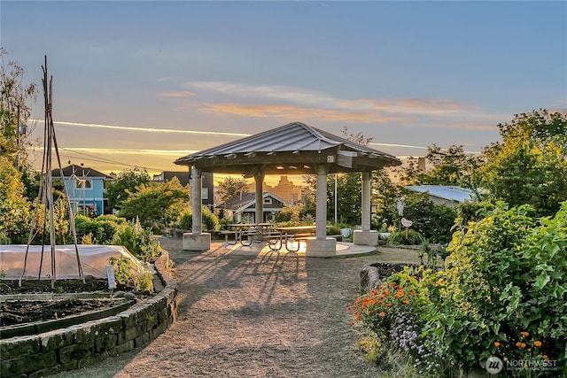 patio terrace at dusk with a gazebo