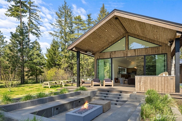 1501 Kokanee Loop, Cle Elum, WA 98922 - view of patio / terrace featuring a deck and an outdoor living space with a fire pit