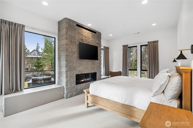 1501 Kokanee Loop, Cle Elum, WA 98922 - carpeted bedroom featuring recessed lighting and a large fireplace