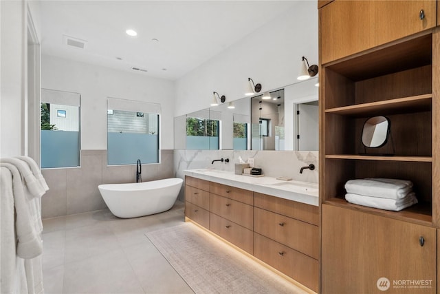 1501 Kokanee Loop, Cle Elum, WA 98922 - full bath with tile walls, plenty of natural light, double vanity, walk in shower, and a freestanding bath