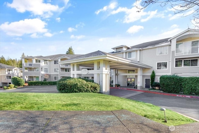 view of building exterior featuring a residential view