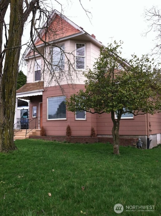 4815 S J St, Tacoma, WA 98408 - view of property exterior featuring a yard