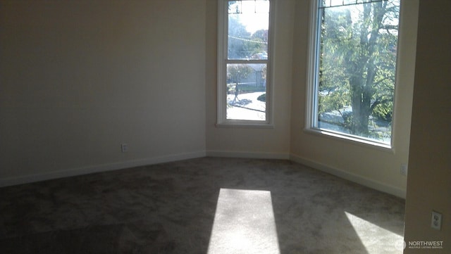 4815 S J St, Tacoma, WA 98408 - carpeted spare room featuring plenty of natural light and baseboards