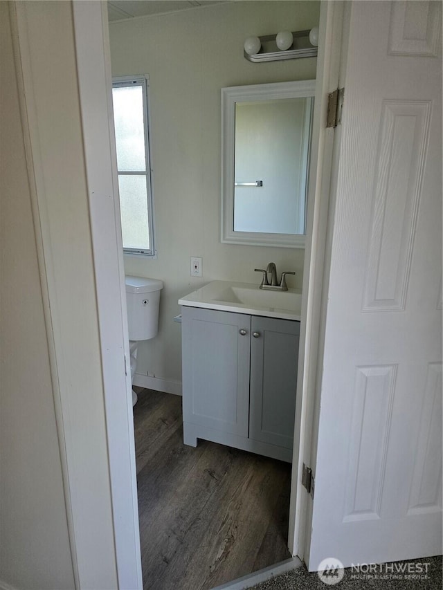 17925 Jordan St SW, Rochester, WA 98579 - half bathroom featuring toilet, wood finished floors, and vanity