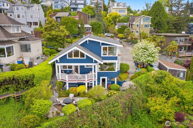 1712 Arch Ave SW, Seattle, WA 98116 - rear view of property featuring central AC and a residential view