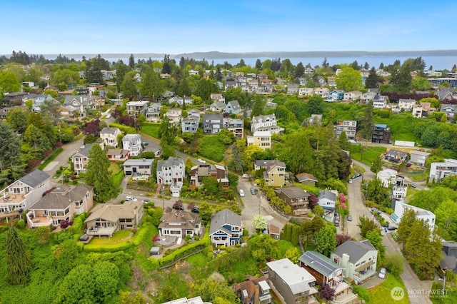 1712 Arch Ave SW, Seattle, WA 98116 - aerial perspective of suburban area featuring a large body of water