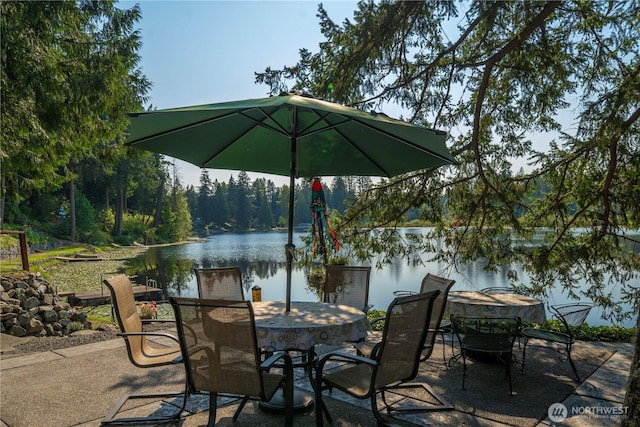 13901 Twin Lakes Dr E, Graham, WA 98338 - view of patio / terrace featuring outdoor dining area and a water view