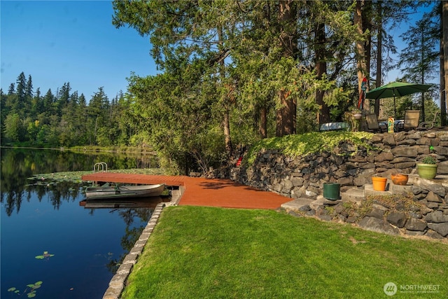 13901 Twin Lakes Dr E, Graham, WA 98338 - dock area featuring a water view and a lawn