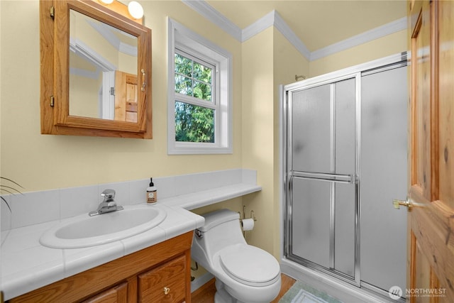 13901 Twin Lakes Dr E, Graham, WA 98338 - full bath featuring ornamental molding, a shower stall, toilet, and vanity