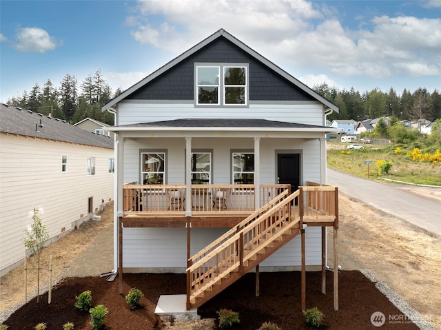 11 E Compass Ln, Allyn, WA 98524 - back of house with covered porch and stairs