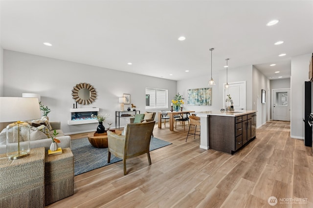 11 E Compass Ln, Allyn, WA 98524 - living area featuring light wood finished floors and recessed lighting