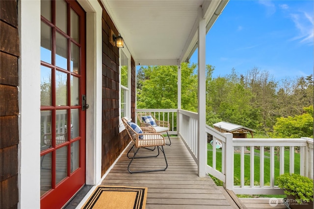 8285 NE Beck Rd, Bainbridge Island, WA 98110 - wooden deck with covered porch