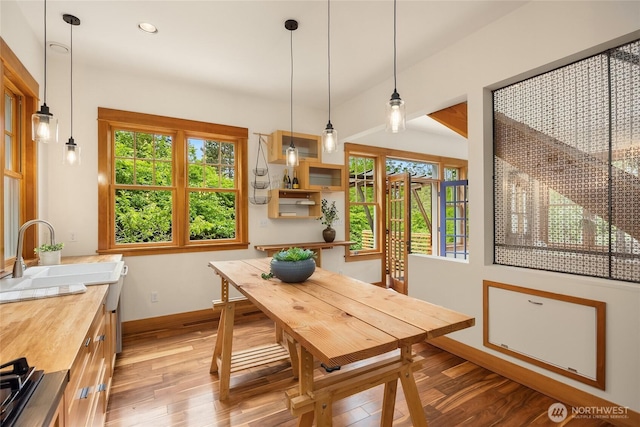 8285 NE Beck Rd, Bainbridge Island, WA 98110 - dining area featuring baseboards, light wood-type flooring, and recessed lighting
