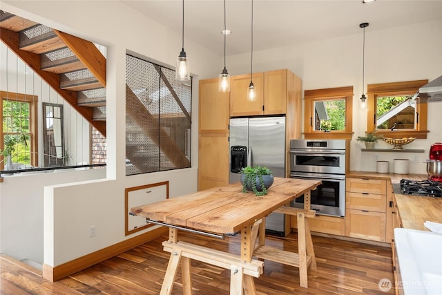 8285 NE Beck Rd, Bainbridge Island, WA 98110 - kitchen featuring light brown cabinets, appliances with stainless steel finishes, wooden counters, dark wood-style flooring, and recessed lighting