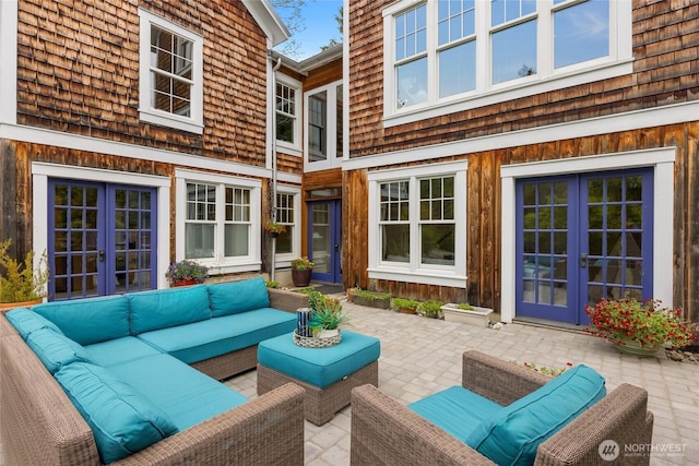 8285 NE Beck Rd, Bainbridge Island, WA 98110 - view of patio / terrace with french doors and outdoor lounge area