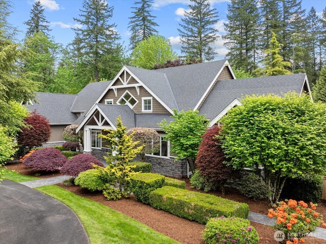 12916 318th Ave NE, Duvall, WA 98019 - craftsman house featuring roof with shingles and stone siding
