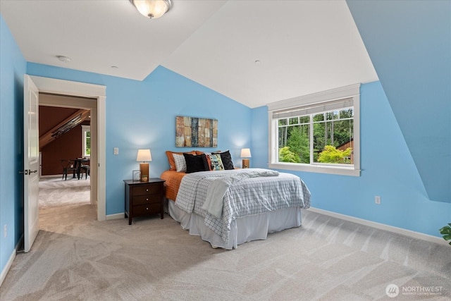 12916 318th Ave NE, Duvall, WA 98019 - carpeted bedroom featuring lofted ceiling and baseboards