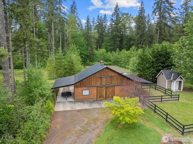 12916 318th Ave NE, Duvall, WA 98019 - view of barn with driveway and a wooded view