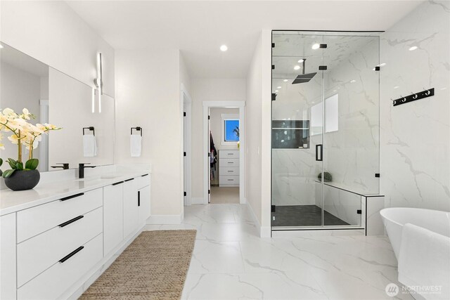 1750 Farmview Ter, Lynden, WA 98264 - bathroom with a marble finish shower, marble finish flooring, baseboards, recessed lighting, and a soaking tub