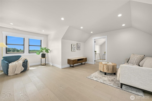 1750 Farmview Ter, Lynden, WA 98264 - sitting room with vaulted ceiling, light wood finished floors, recessed lighting, and baseboards