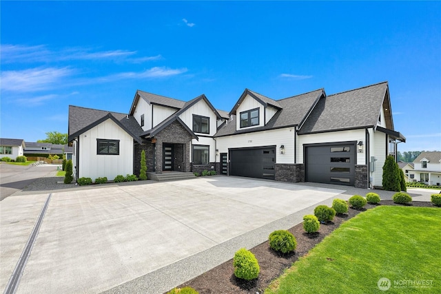 1750 Farmview Ter, Lynden, WA 98264 - modern farmhouse style home featuring board and batten siding, driveway, stone siding, a shingled roof, and a front lawn