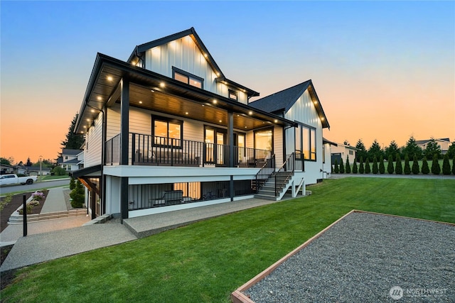 1750 Farmview Ter, Lynden, WA 98264 - back of property with board and batten siding and a yard