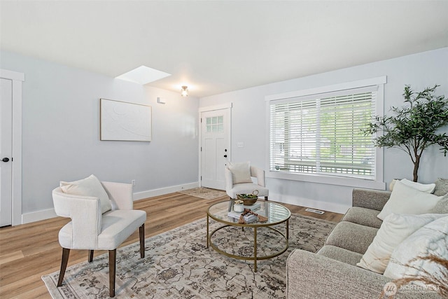 14908 93rd Ave E, Puyallup, WA 98375 - living area featuring light wood-type flooring and baseboards