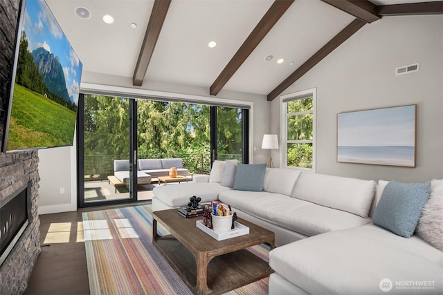 living room featuring beam ceiling, wood finished floors, recessed lighting, a fireplace, and high vaulted ceiling