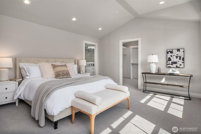 carpeted bedroom featuring lofted ceiling, a spacious closet, and recessed lighting