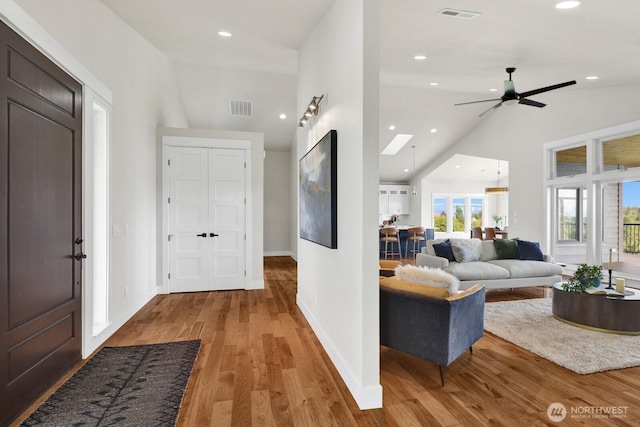 5754 W 26th Crst, Ferndale, WA 98248 - entrance foyer featuring vaulted ceiling, light wood-type flooring, a ceiling fan, baseboards, and recessed lighting